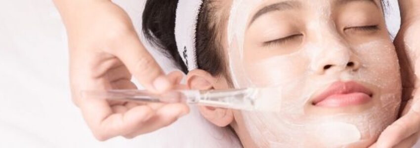 A woman having a chemical peel facial treatment.