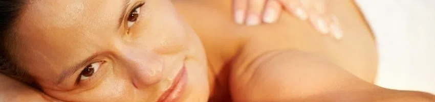 Beautiful woman reciving a back massage at the spa