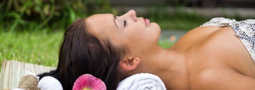 Woman lying and relaxing thinking why her skin is darker than before