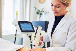 Clinic Technician Performing Electrolysis