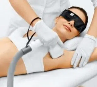 Laser hair removal services being done on the armpit.