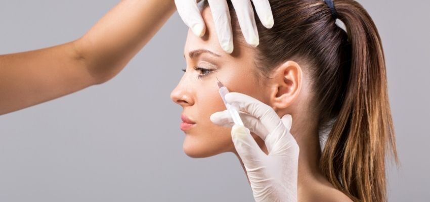 A woman going through a Xeomin treatment.