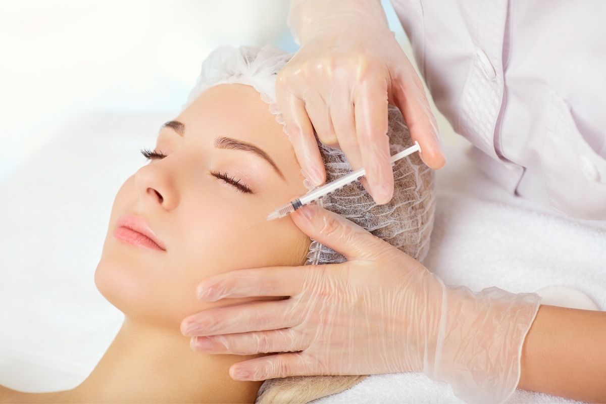 A woman going through a botox treatment.