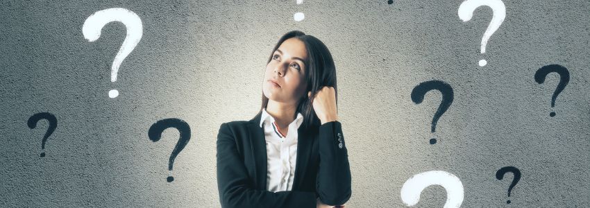 A woman wondering about breast implant sizes.