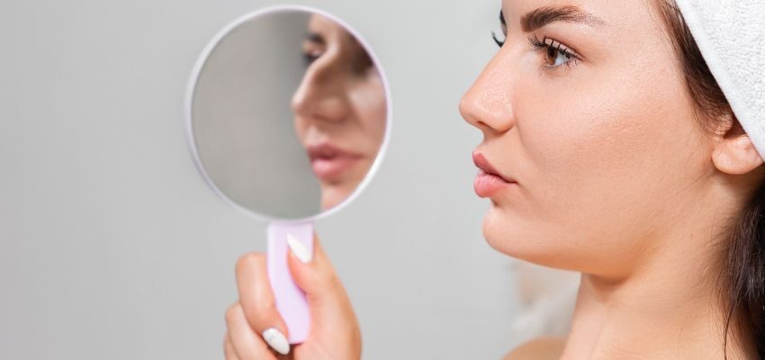 The woman undergoes rhinoplasty to have a perfect nose.