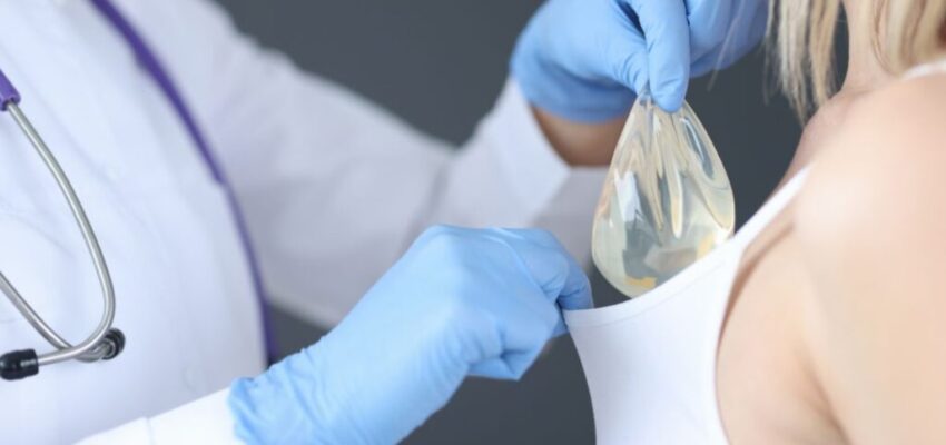 A woman getting breast implants asks the surgeon if the implants should be over or under the muscle.