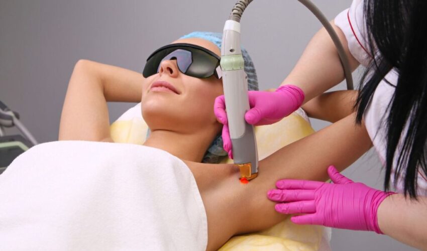 A woman is happy while undergoing laser hair removal for ingrown hair.