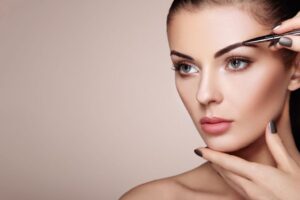The woman has heavy eyebrows after Botox.