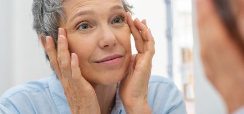 The woman is happy that her droopy eyelids are lessened.