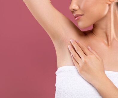 The woman has dark armpits.