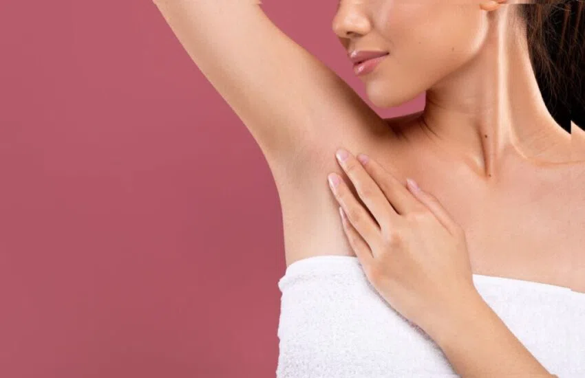 The woman has dark armpits.