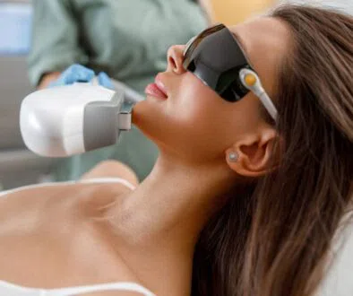 The woman undergoes IPL photofacial to get rid of skin problems.