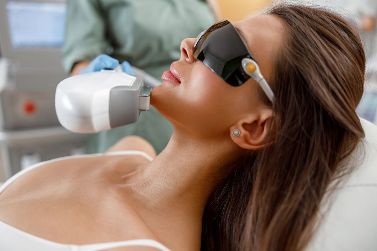 The woman undergoes IPL photofacial to get rid of skin problems.