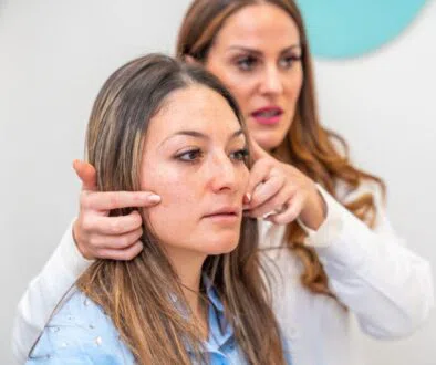 A dermatologist discussing facial vein treatment