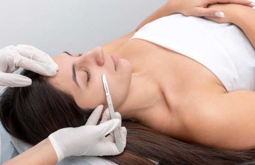 The woman feels relaxed while having a Dermaplane at home.