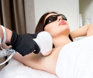 The woman is undergoing laser hair removal.